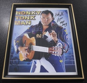 lot 81 image: Honky Tonk Man WWE Hall of Fame Autograph 8x10 Photo w Frame
