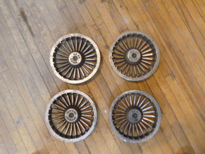 lot 48 image: 4 EZ GO Hub Caps