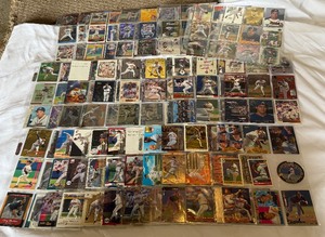 lot 38 image: Greg Maddux 214 Baseball Card Lot - Die Cuts, Metal, Finest, Gold, SPx, Ex, Sample, Chrome, and More