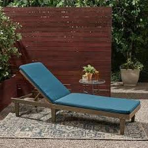 lot 62 image: Nadine 23.75 in. x 13 in. Outdoor Patio Chaise Lounge Cushion in Blue by Noble House  Customer Returns See Pictures
