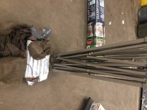 lot 23 image: JOYSIDE 11 ft. x 11 ft. Beige Steel Pop-Up Gazebo with Mosquito Netting Broken  Customer Returns See Pictures
