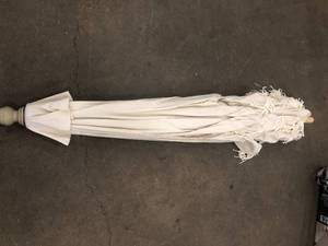 lot 28 image: 9 ft. Auto Tili Umbrella   Customer Returns See Pictures