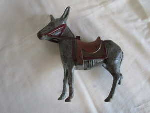 lot 55 image: Cast Donkey Bank, Broken Rear Leg