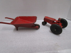 lot 28 image: Oliver 88 Diecast Toy Farm Tractor, Wheelbarrow