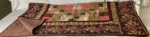 lot 107 image: Vintage Machine Stitched Quilt 68 x 51