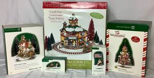 lot 167 image: Department 56 North Star Commuter Train Station, Northern Lights Fire Station, Raising the Flag at the North Pole, Rescue Ready and Santas Toy Company