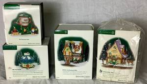 lot 182 image: Dept 56 North Pole Series Caribou Coffee, Tilles Tiny Cup Caf, Hot Chocolate Tower and McElfins Irish Restaurant & Gifts