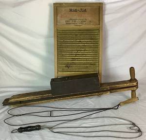 lot 50 image: Antique Bundle of Rug Beaters, Rid-Jid Washboard J. R. Clark Co. Minneapolis, MN. and The Triumph Hand -Operated Seed Planter Janesville, Wis.