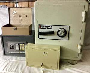 lot 57 image: Four Safes - Sentry Combo Floor Safe 23 H x 17 W x 13.75 D , ADG Sports Electronic Safe 14 W x 10 D x 9.75 H and Two Metal Lock Boxes with keys