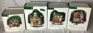 lot 173 image: Department 56 North Pole Series Northern Lights Tinsel Mill, Cold Care Clinic, Hand Carved Nutcracker Factory and North Pole Town Hall