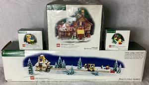 lot 184 image: Dept 56 North Pole Series Lego Bundle - Lego Warehouse Forklift, Lego Building Creation Station, Brick Lift and Little Builders