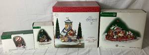 lot 185 image: Dept 56 North Pole Series Santas Sleigh Launch Gift Set, Luckys Pony Rides, North Pole Petting Zoo and Dash Away Delivery Hot Air Balloon