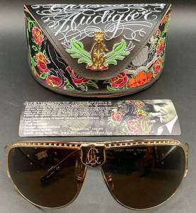 lot 25 image: Christian Audigier Vintage Sunglasses and Case CAS401 72-8-125