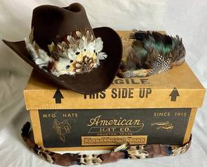 lot 21 image: American Hat Co. 3X Clear Beaver Cowboy Hat Size 7 with Feather Band (Comes with Original Box)