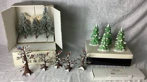 lot 321 image: Department 56 Village Accessories - Variety of Trees, 5 Trees with Cardinals, 1 Flexible Sisal Hedge, Set of 4 Porcelain Snow Capped Trees, and Norway Scotch Flocked Pine Trees