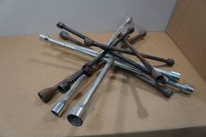 lot 142 image: 4-Way Lug Wrenches