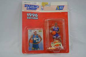 lot 12 image: Starting Lineup Grant Hill Action Figure & Trading Card 1996