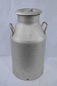 lot 16 image: Silver Aluminum Milk Jug