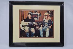 lot 73 image: Signed Waynes World Movie Photo