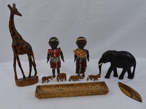 lot 78 image: Wooden African Animals and Traditionally Dressed Dolls