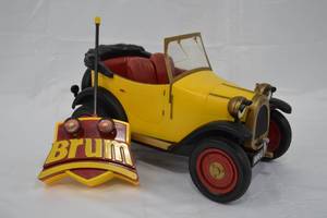 lot 124 image: Vintage Radio Shack Ragdoll Brum Remote Control Toy