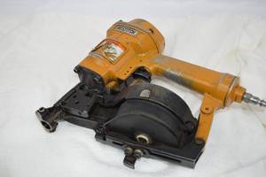 lot 125 image: Bostitch Tool N12 Air Powered Coil Roofing Nail Gun