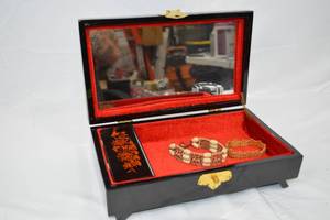 lot 135 image: Wooden Mother of Pearl Jewelry Box with Bracelets
