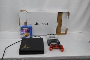 lot 178 image: PlayStation 4 with 2 Games and 3 Remotes