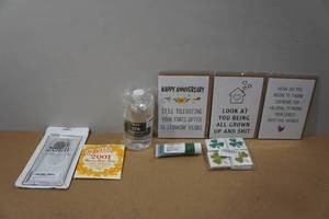 lot 39 image: Greeting Cards, Phone Case, Make-Up Remover and Guitar Strings