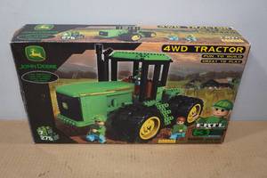 lot 110 image: Ertl John Deere 4WD Tractor Building Set