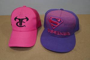 lot 218 image: Pink and Purple Hats - Supergirl, Bone Collector