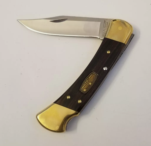 lot 485 image: Buck 110 Folding Hunter 50th Anniversary 420HC Steel