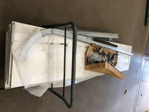 lot 20 image: Clopay Classic Steel Short Panel 8 ft x 7 ft Non-Insulated White Garage Door without Windows Damaged Missing Pieces Sold As Is  Customer Returns See Pictures