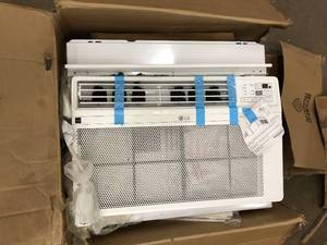 lot 7 image: LG Air Conditioner 12,000 BTU Slight Damage Covered   Customer Returns See Pictures