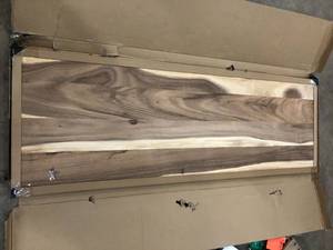 lot 8 image: HARDWOOD REFLECTIONS 6 ft. L x 25 in. D Unfinished Saman Solid Wood Butcher Block Countertop With Live Edge   Customer Returns See Pictures