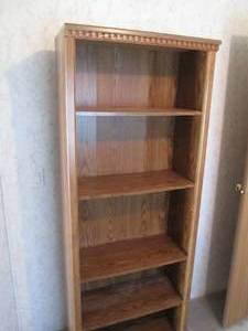 lot 49 image: Wood tone multi-tier Bookcase appro...
