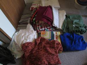 lot 140 image: Healthy size lot of assorted afghan...