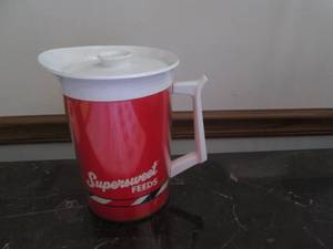 lot 145 image: Vintage Supersweet Feeds logo Pla...