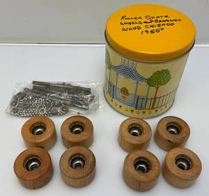 lot 222 image: 1940s-50s  Wooden Roller Skate Wheels