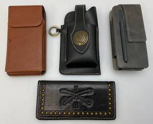 lot 224 image: Misc. Leather Pouches Some With Designs