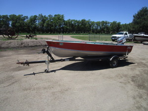 lot 6 image: 1974 14 Lund Boat & 1976 Snow Trailer