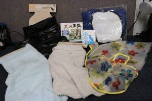 lot 11 image: Dog sweaters, rain coat, jackets, h...