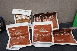lot 59 image: 5 bags of snake repellent and 1 bag...