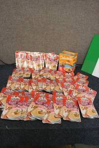 lot 63 image: Huge cat treat lot of delectables...