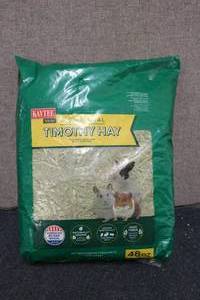 lot 66 image: 48oz bag of Timothy Hay...