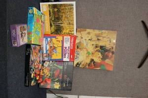 lot 89 image: 6 puzzles with puzzle book...