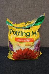 lot 176 image: Bag of potting soil...