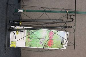 lot 200 image: random garden poles and hangers...