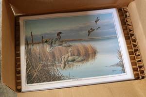 lot 93 image: Box of laminated prints Follow The...