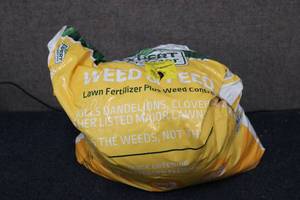 lot 181 image: Bag of weed and seed Lawn fertilize...